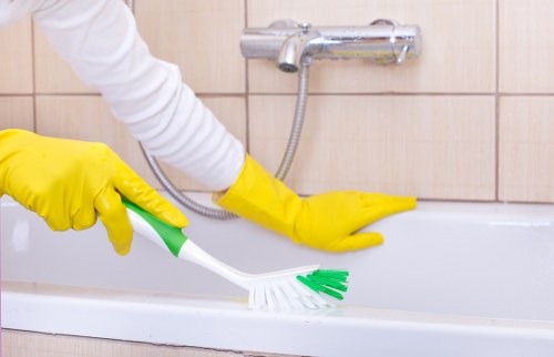 Safe cleaning team working around a treated carpeted area